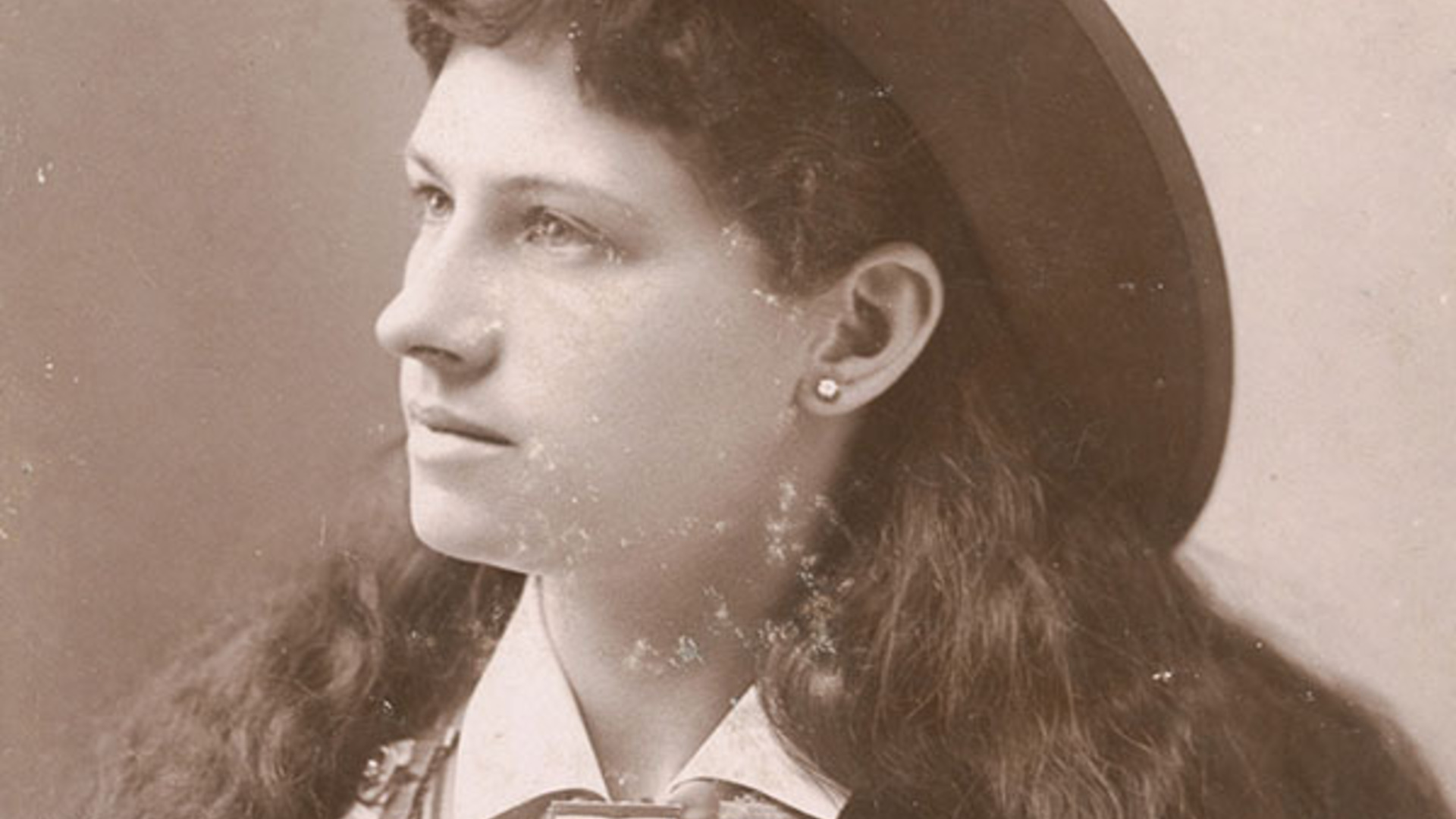 Charles E. Stacey, American, <i>Annie Oakley, </i>ca. 1891, albumen print mounted on cardboard, 5.55 x 3.9 inches. Acquired with funds provided by the Mr. and Mrs. Raymond T. Duncan Endowment for American Art. 2014.001.084