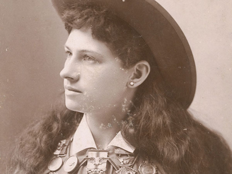 Charles E. Stacey, American, <i>Annie Oakley, </i>ca. 1891, albumen print mounted on cardboard, 5.55 x 3.9 inches. Acquired with funds provided by the Mr. and Mrs. Raymond T. Duncan Endowment for American Art. 2014.001.084