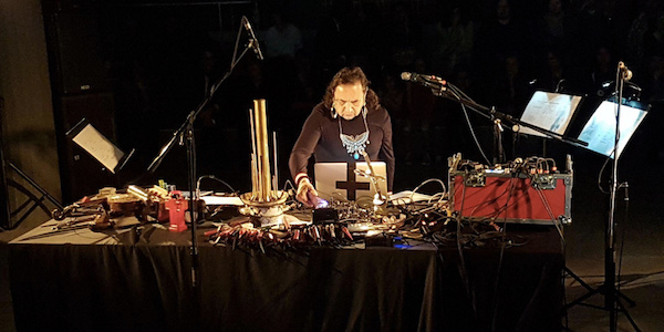 Artist and experimental composer Guillermo Galindo performing.